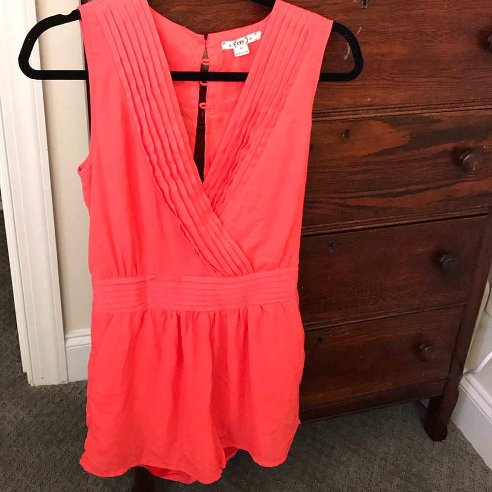 Almost a neon orange romper